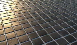 Schwarze Mosaikfliesen mit grauen Fugen.